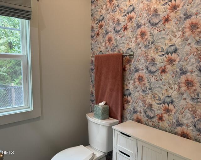 574 East Ridge Avenue Liberty, NC 27298 - Photo 23 of 28 a bathroom with a toilet and a window