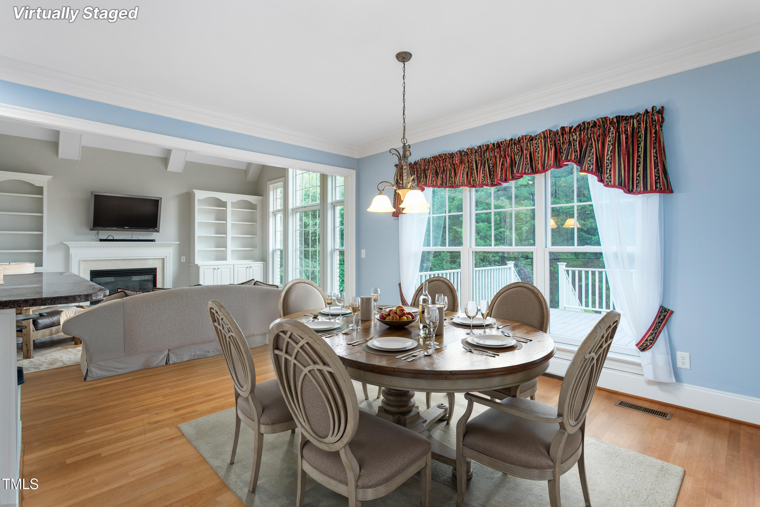 6366 Lineberry Road Liberty, NC 27298 - Photo 17 of 44 a dining room with furniture window and wooden floor