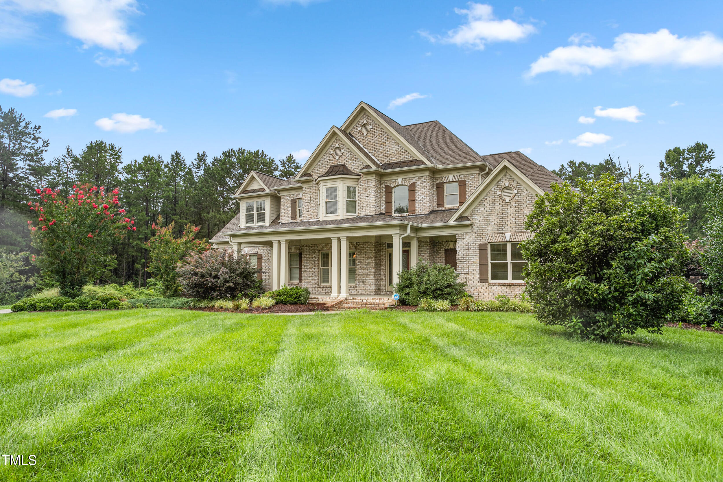 6366 Lineberry Road Liberty, NC 27298 - Photo 2 of 44 a front view of a house with a yard
