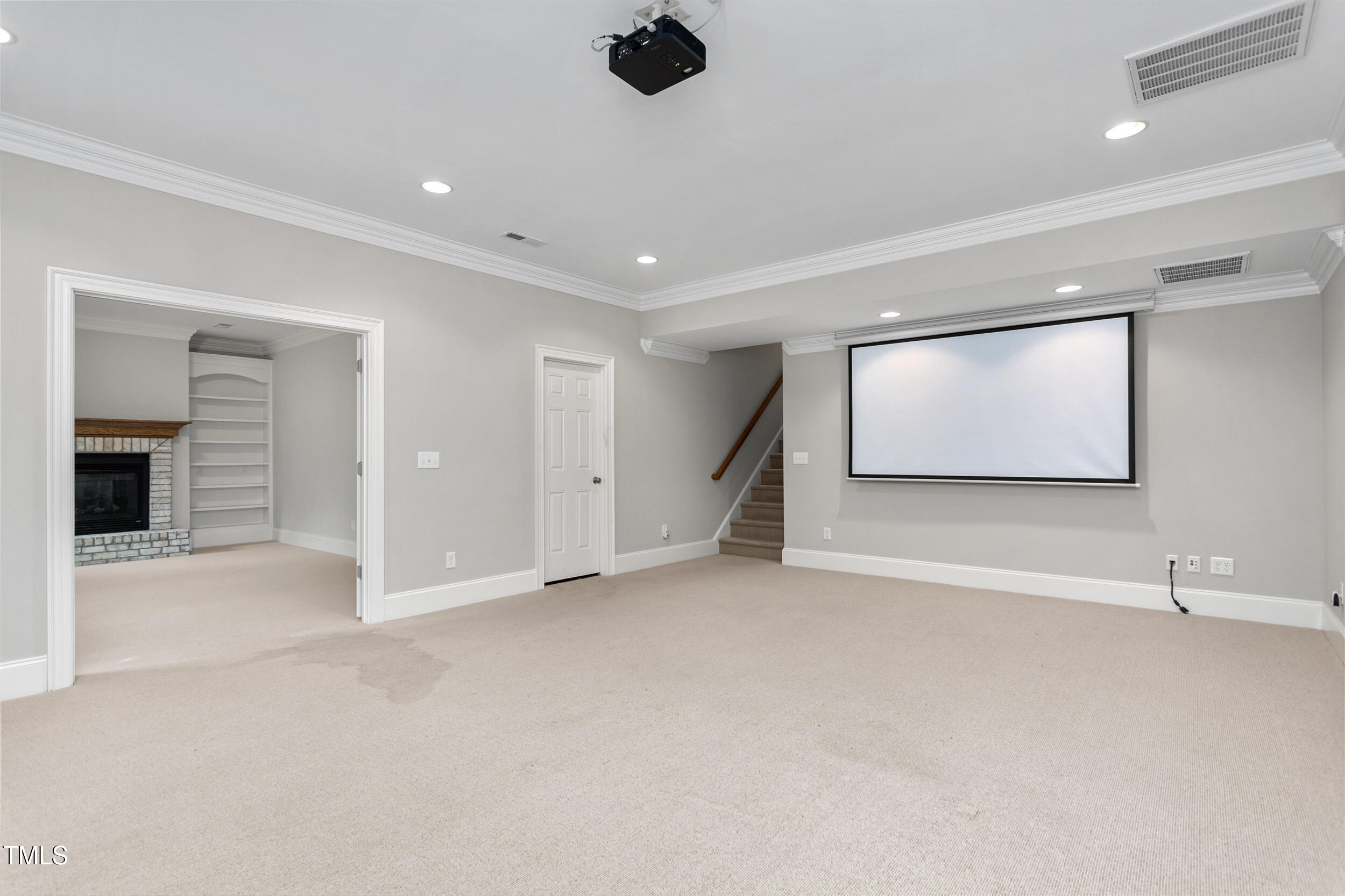 6366 Lineberry Road Liberty, NC 27298 - Photo 32 of 44 an empty room with windows and fireplace