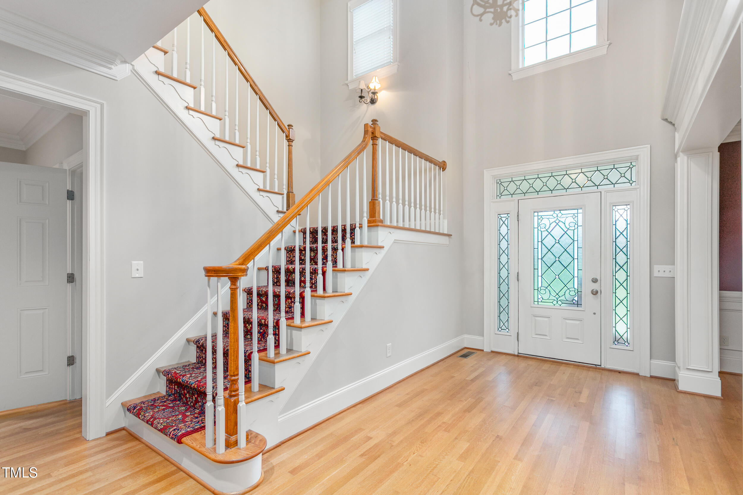 6366 Lineberry Road Liberty, NC 27298 - Photo 7 of 44 a view of an entryway with wooden floor