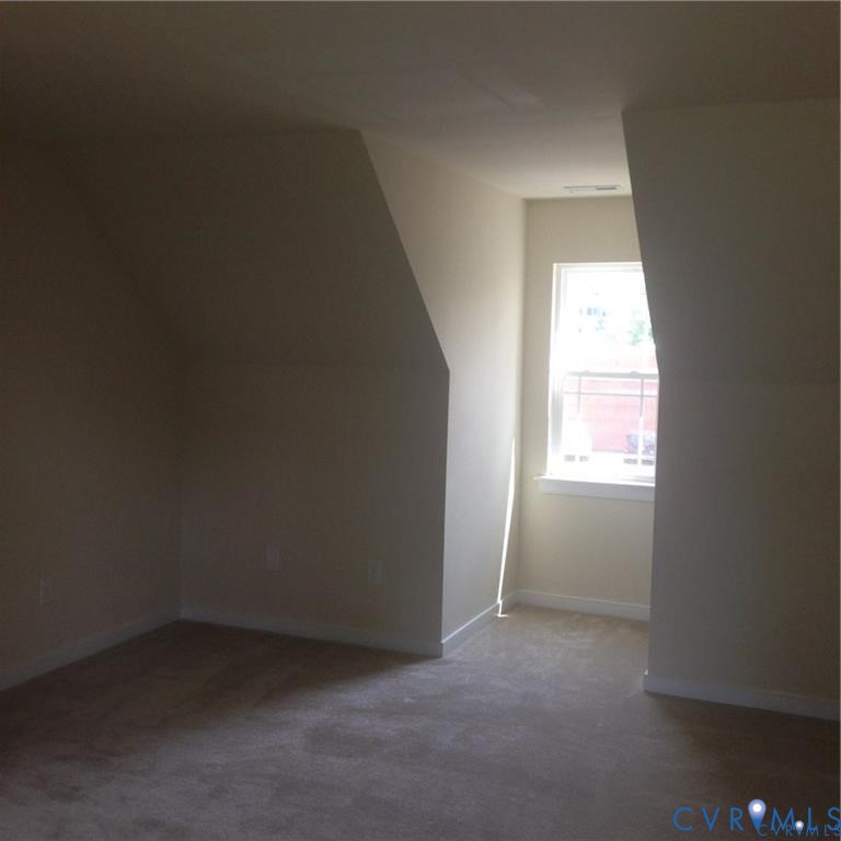 4816 Bethlehem Road Richmond, VA 23230 - Photo 8 of 11 an empty room with a window
