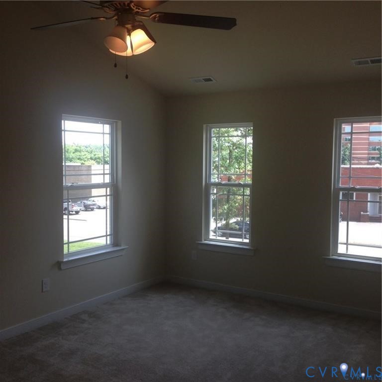 4816 Bethlehem Road Richmond, VA 23230 - Photo 9 of 11 an empty room with a window