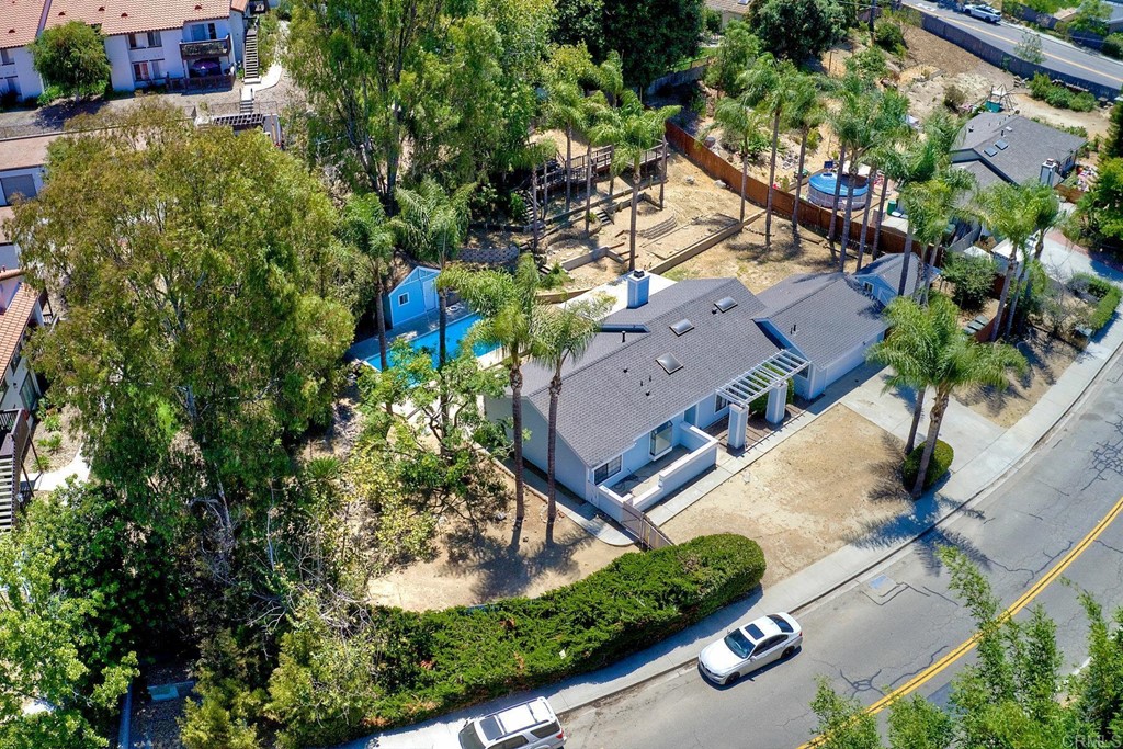 875 Viewpoint Drive San Marcos, CA 92078 - Photo 1 of 60 an aerial view of a house with a yard and lake view