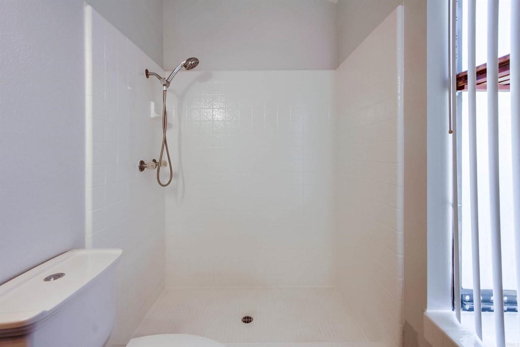 875 Viewpoint Drive San Marcos, CA 92078 - Photo 29 of 60 a bathroom with a shower and toilet