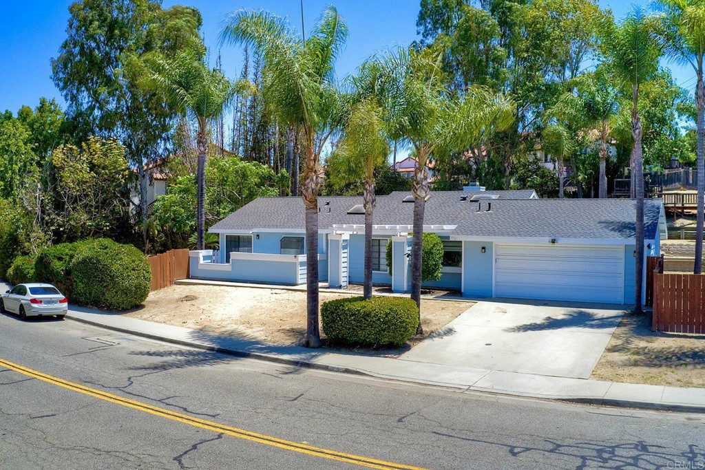 875 Viewpoint Drive San Marcos, CA 92078 - Photo 3 of 60 a view of a house with a large space and a large parking space