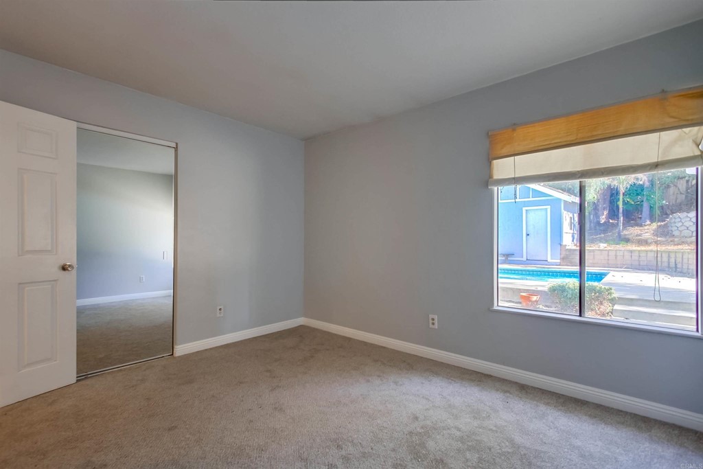 875 Viewpoint Drive San Marcos, CA 92078 - Photo 32 of 60 an empty room with windows