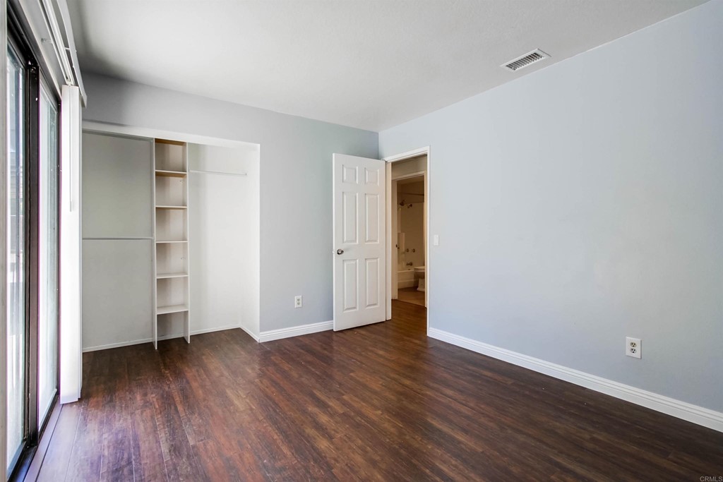 875 Viewpoint Drive San Marcos, CA 92078 - Photo 36 of 60 a view of an empty room with wooden floor