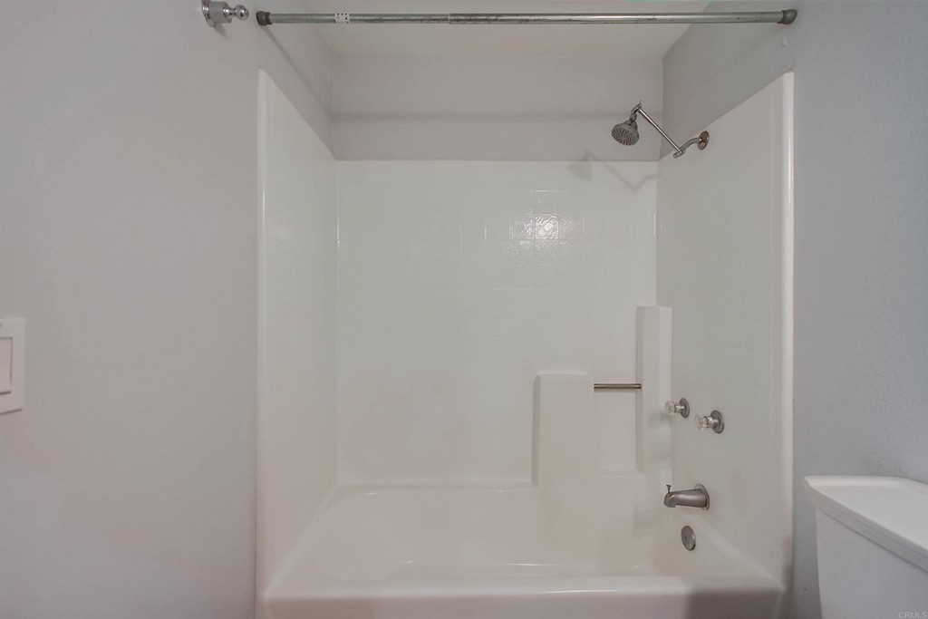 875 Viewpoint Drive San Marcos, CA 92078 - Photo 38 of 60 a close up of a bathtub curtain