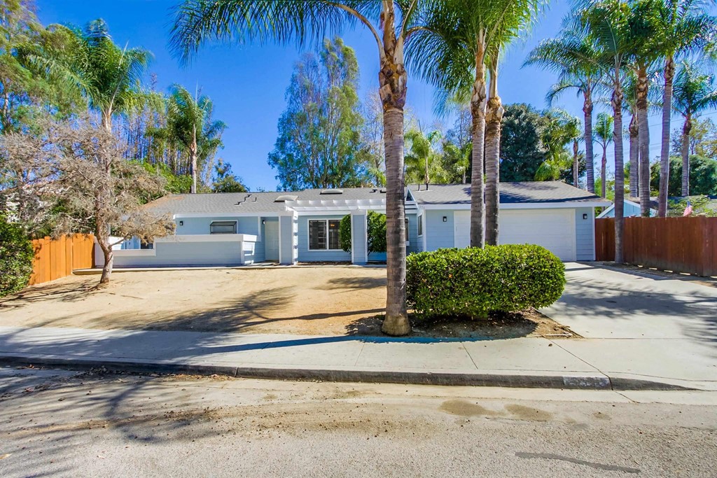 875 Viewpoint Drive San Marcos, CA 92078 - Photo 4 of 60 a house with palm tree in front of it