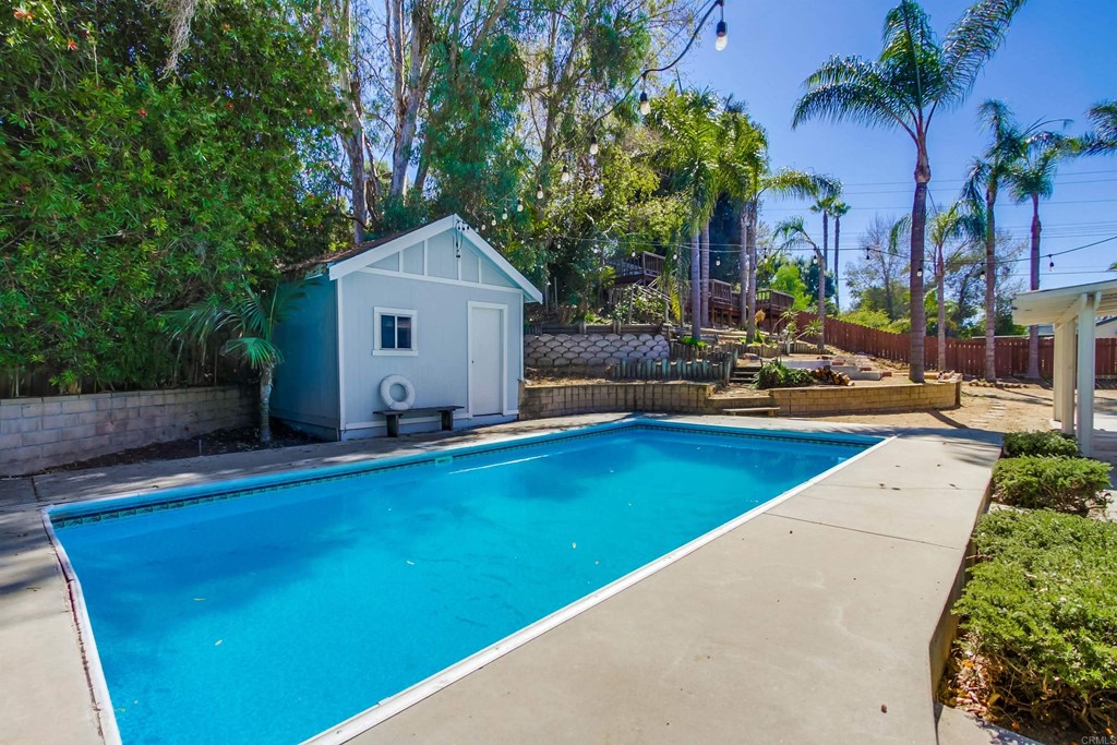 875 Viewpoint Drive San Marcos, CA 92078 - Photo 43 of 60 a view of a house with a backyard and swimming pool