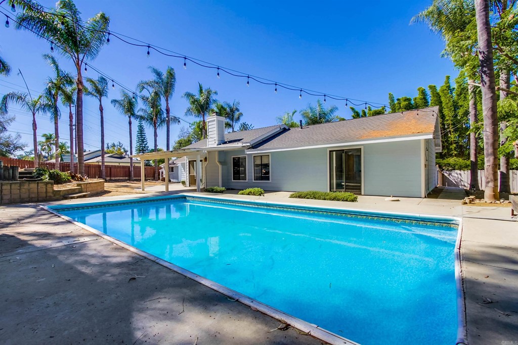 875 Viewpoint Drive San Marcos, CA 92078 - Photo 45 of 60 a view of a house with pool and chairs