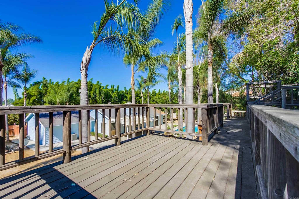 875 Viewpoint Drive San Marcos, CA 92078 - Photo 6 of 60 a view of balcony with wooden floor and outdoor seating