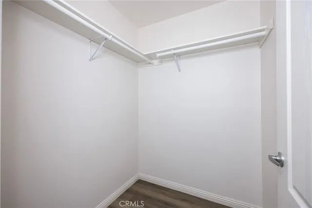 a view of an empty walk in closet