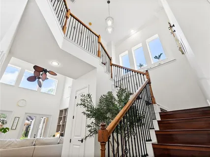 a kitchen with stainless steel appliances a refrigerator sink and stove
