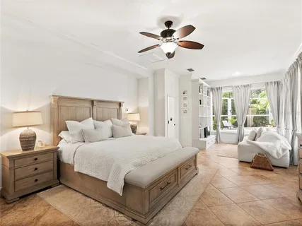 a view of a field with trees in front of it