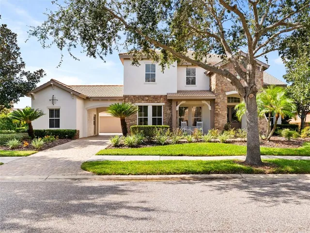 a front view of a house with patio