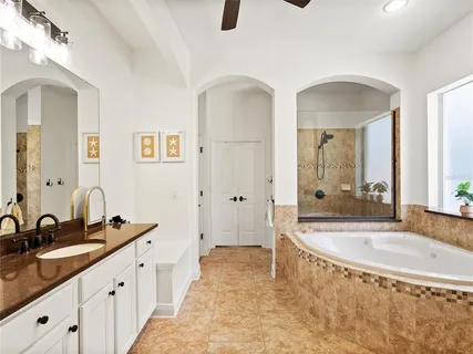 an aerial view of residential houses with outdoor space and river