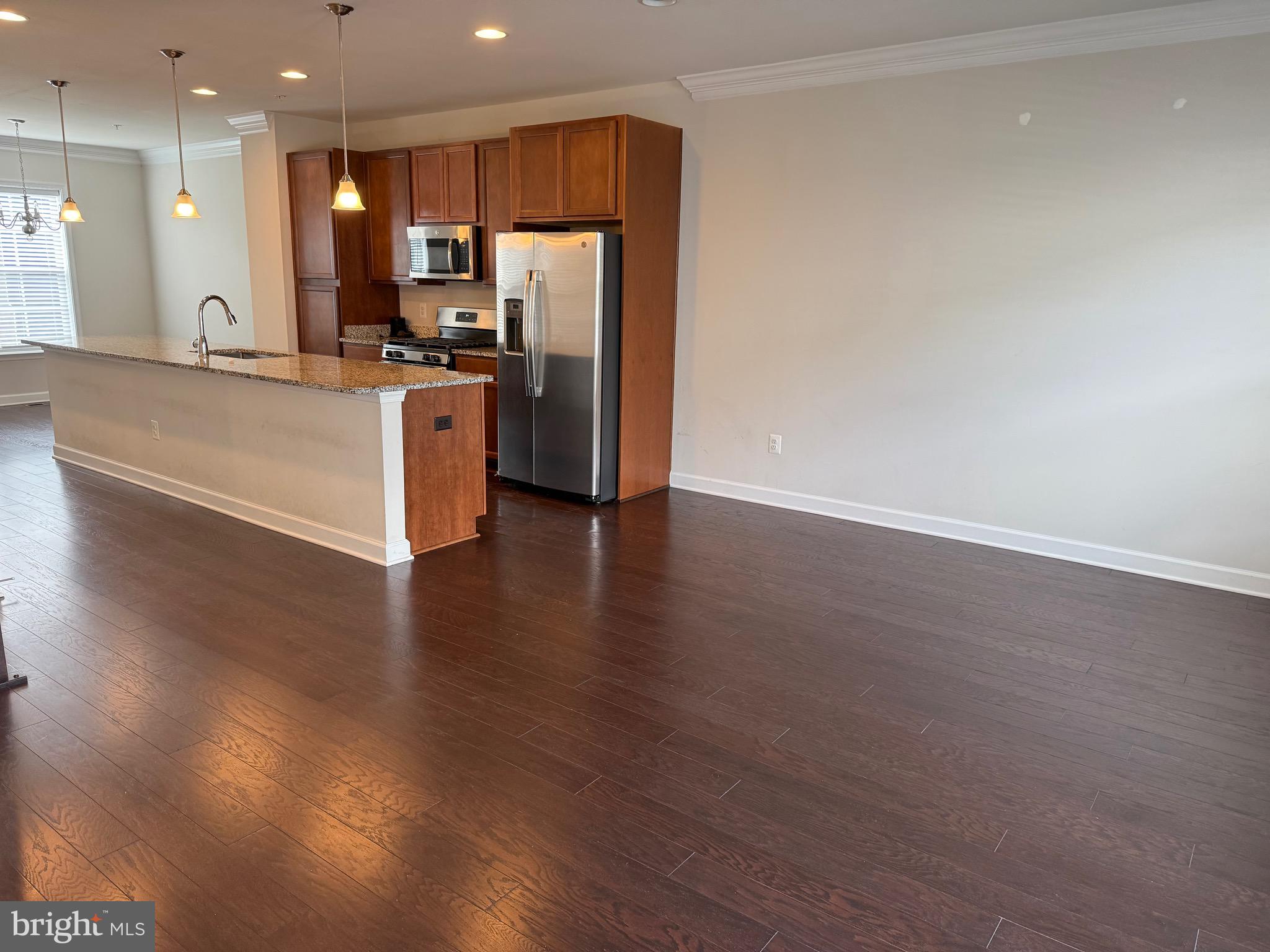 3038 Mia Lane Upper Marlboro, MD 20774 - Photo 2 of 6 a kitchen with stainless steel appliances a refrigerator and a stove top oven
