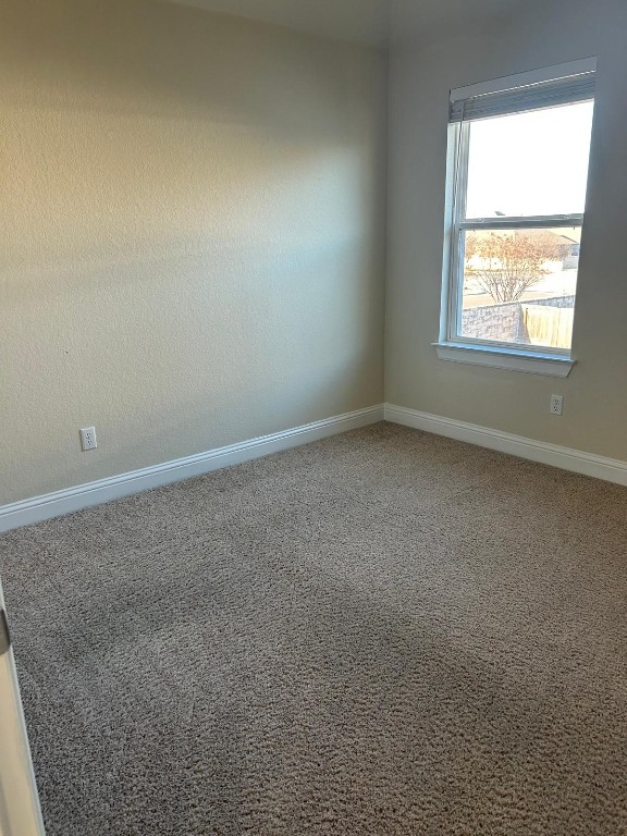 108 Landry Street Georgetown, TX 78628 - Photo 11 of 14 an empty room with a window