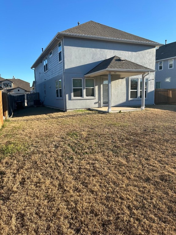 108 Landry Street Georgetown, TX 78628 - Photo 14 of 14 a front view of a house with a garden