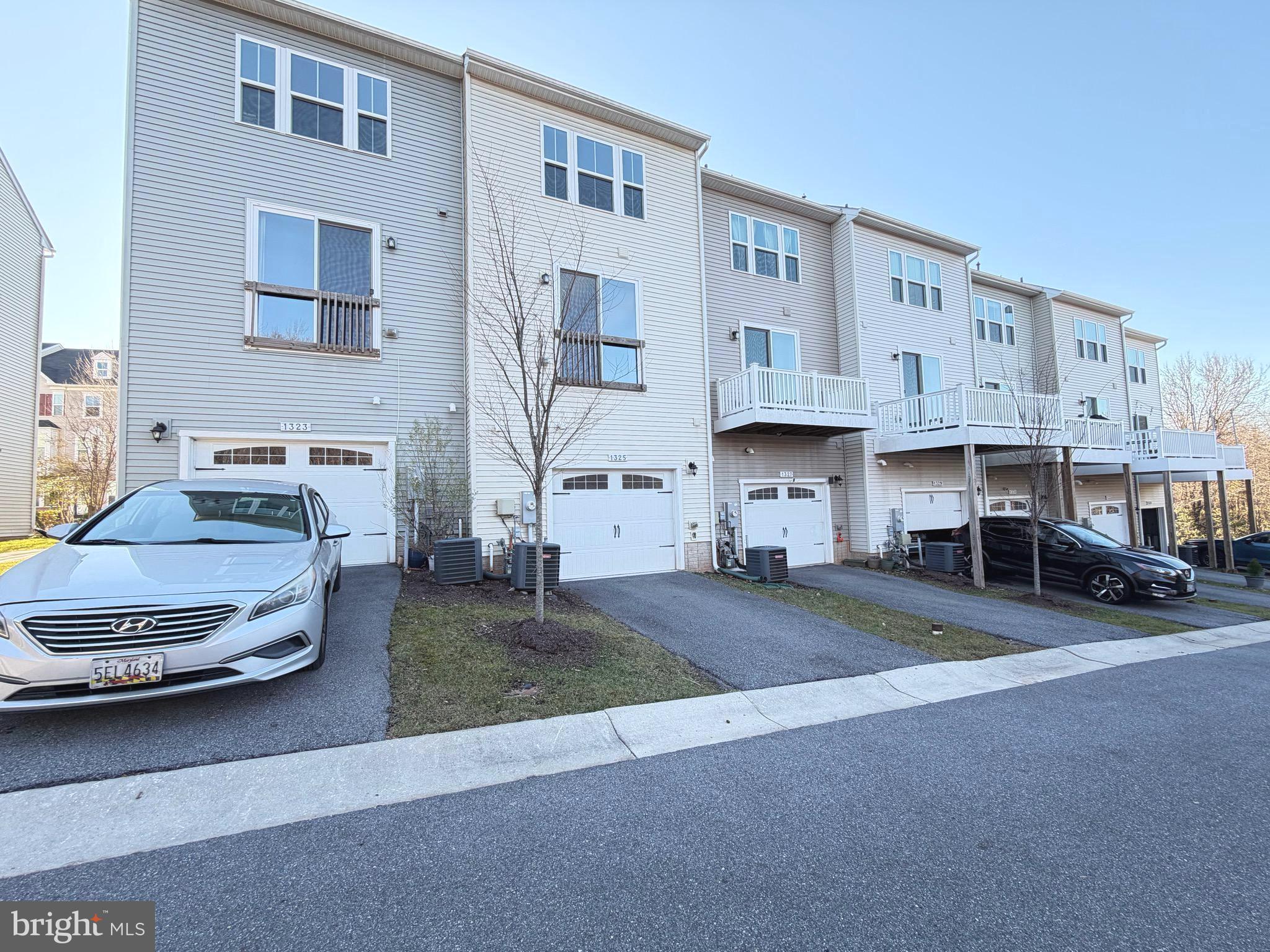 1325 Bruley Road Hanover, MD 21076 - Photo 22 of 22 a view of a street that has couple of cars parked in front of it