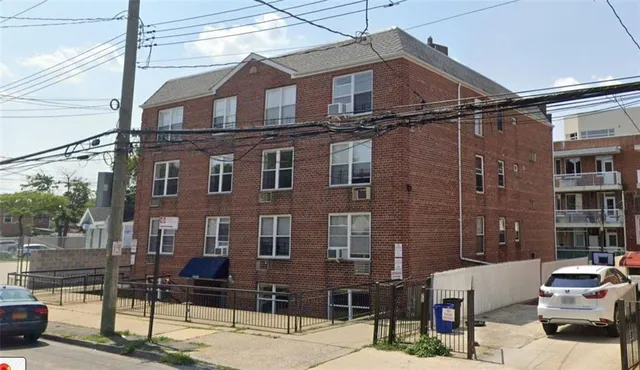 a front view of a building with street