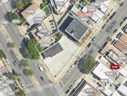 an aerial view of a house with a big yard