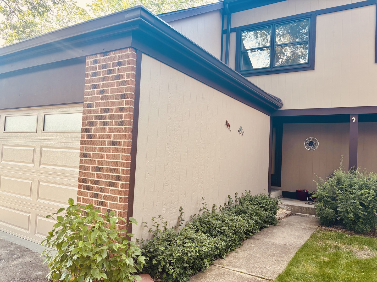 325 Shadow Bend Drive Wheeling, IL 60090 - Photo 2 of 26 a front view of a house with plants