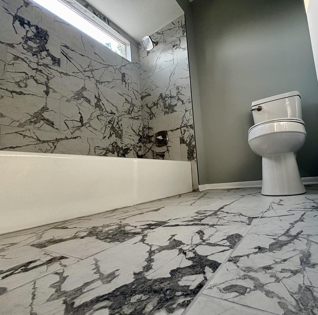 325 Shadow Bend Drive Wheeling, IL 60090 - Photo 22 of 26 a bathroom with a sink and a toilet