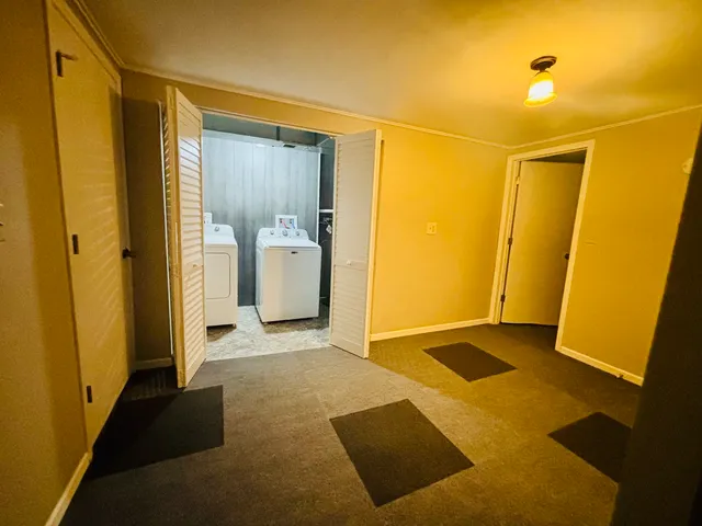 a view of a bathroom with a glass door