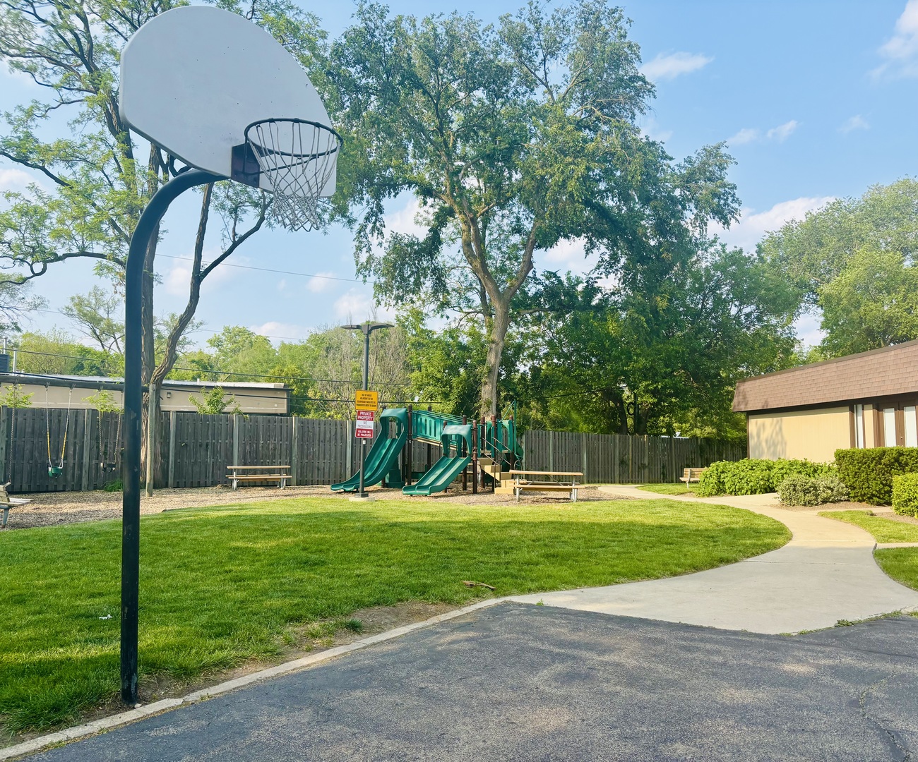 325 Shadow Bend Drive Wheeling, IL 60090 - Photo 3 of 26 a front view of a house with garden and trees