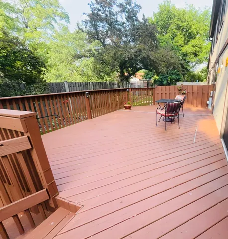 a terrace view with sitting space and trees