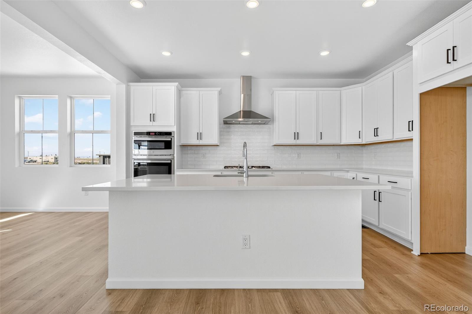 4297 Ridgewalk Point Castle Rock, CO 80108 - Photo 18 of 50 a view of kitchen with wooden floor