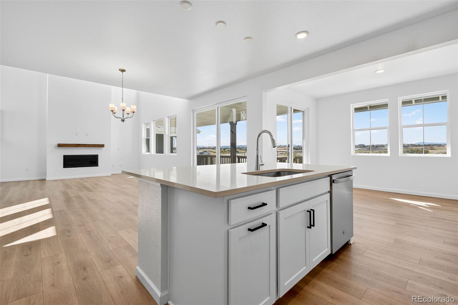 4297 Ridgewalk Point Castle Rock, CO 80108 - Photo 20 of 50 a bathroom with a sink double vanity granite and a mirror