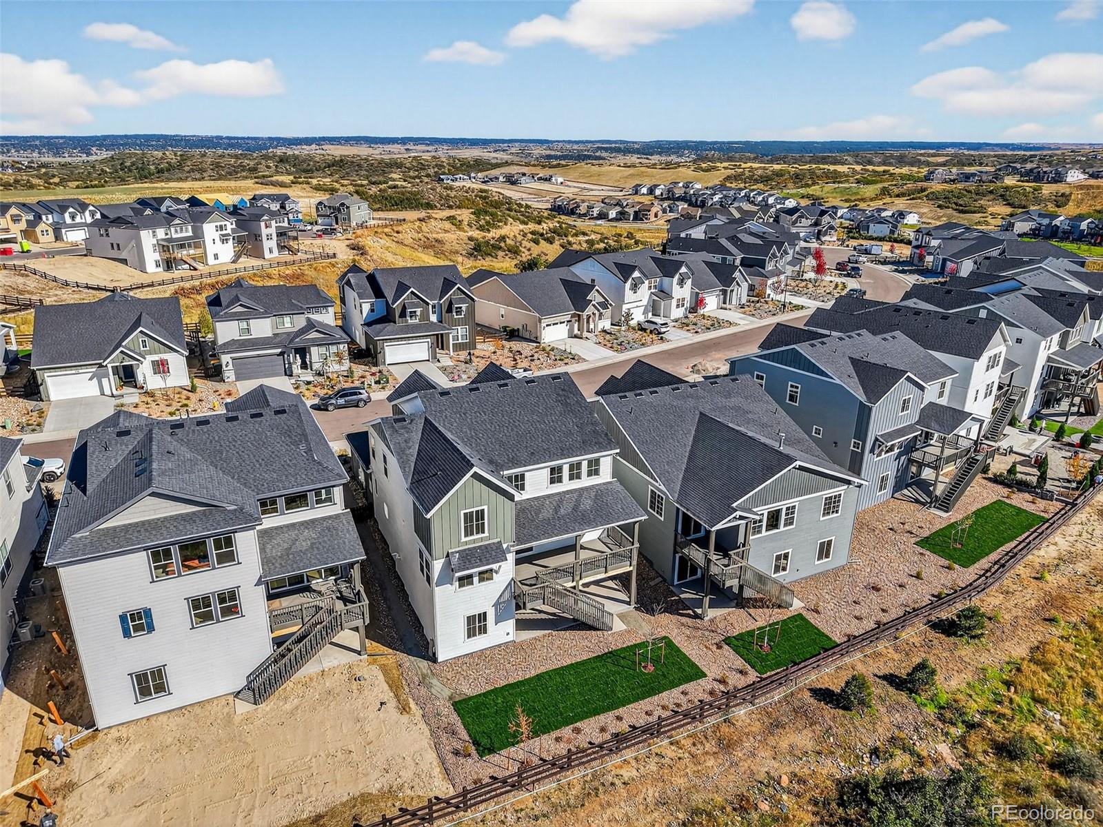 4297 Ridgewalk Point Castle Rock, CO 80108 - Photo 30 of 50 an aerial view of residential building with parking space