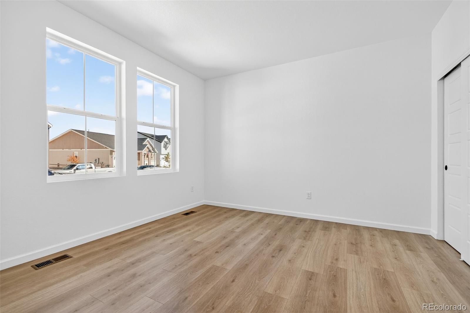 4297 Ridgewalk Point Castle Rock, CO 80108 - Photo 9 of 50 an empty room with windows