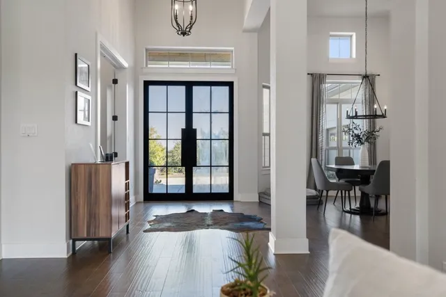 wooden floor in a livingroom and a dining room with wooden floor windows