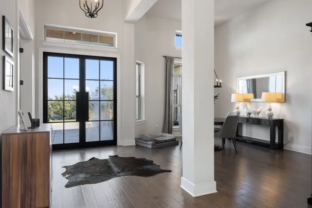 a bedroom with furniture and a window