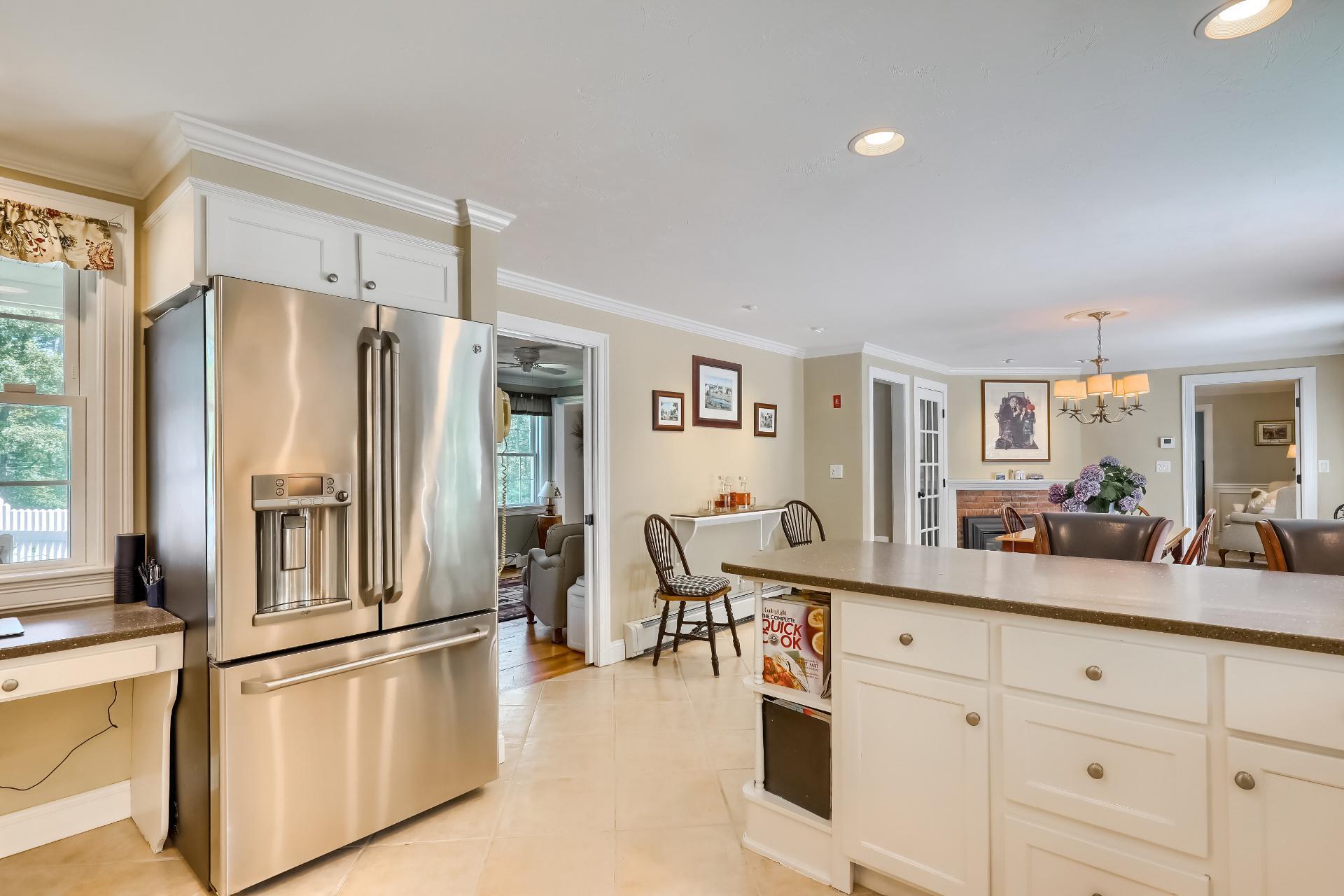 279 Service Road East Sandwich, MA 02537 - Photo 11 of 44 a kitchen with stainless steel appliances a refrigerator sink and cabinets