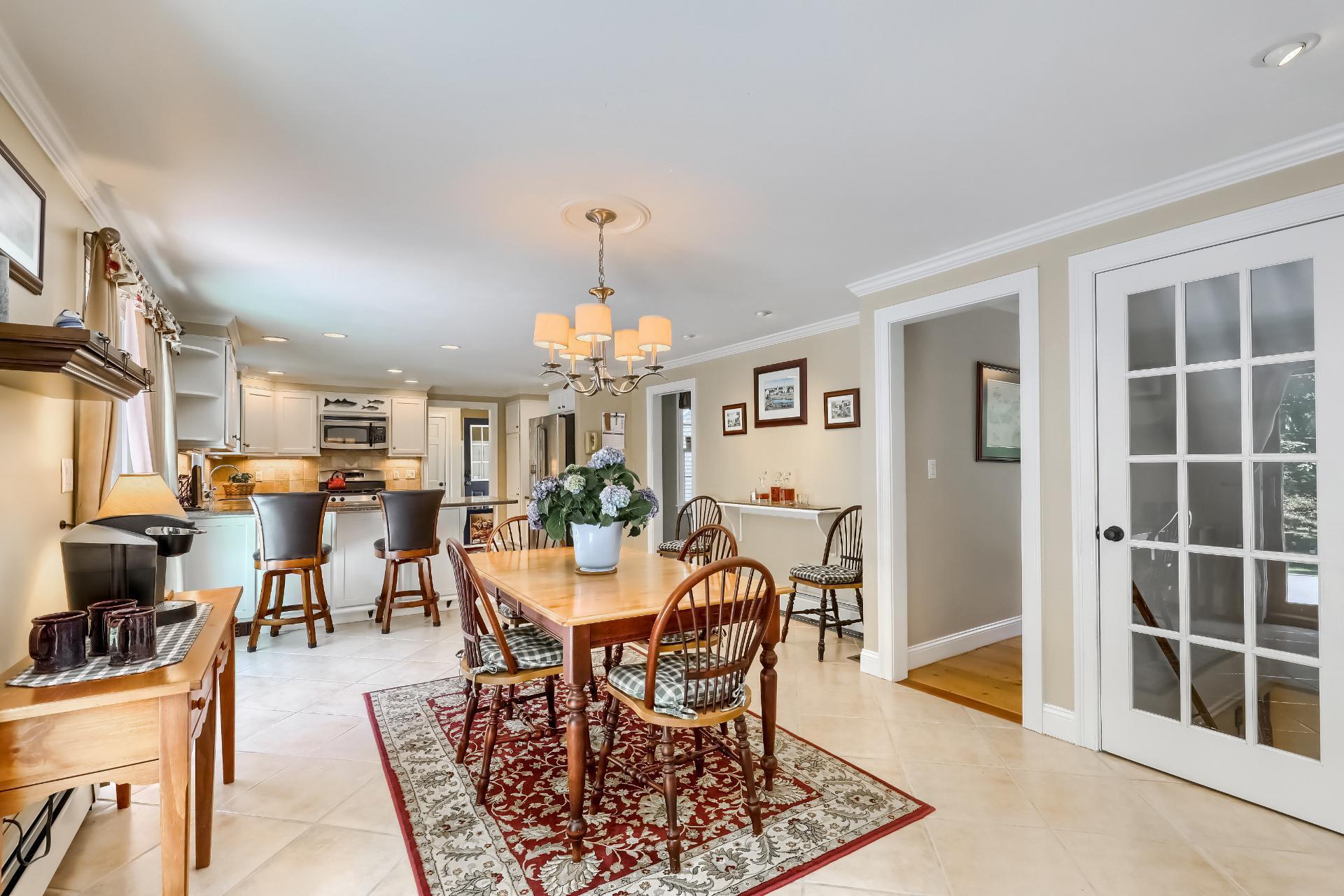 279 Service Road East Sandwich, MA 02537 - Photo 13 of 44 a view of a dining room with furniture