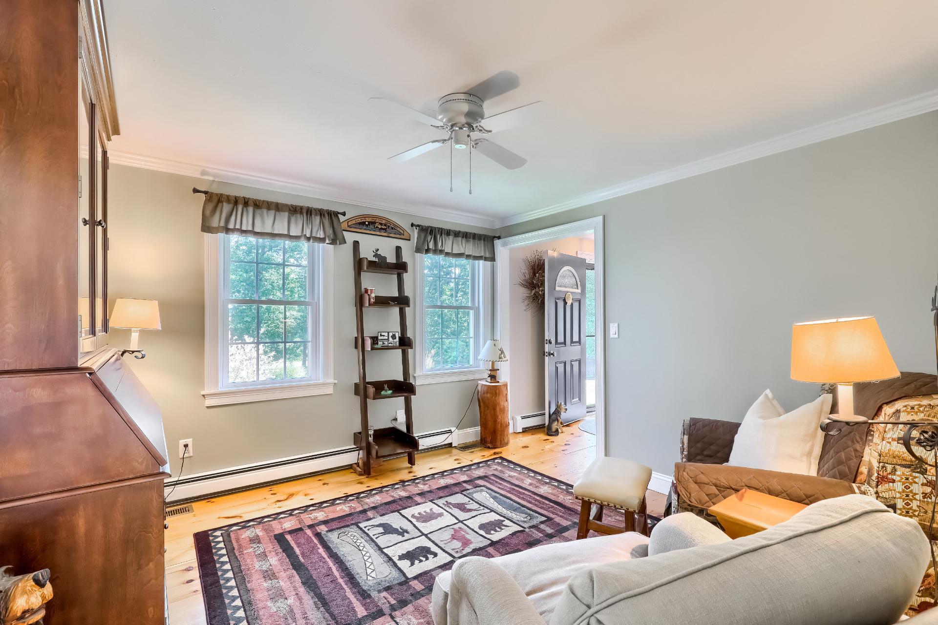 279 Service Road East Sandwich, MA 02537 - Photo 15 of 44 a living room with furniture and a window