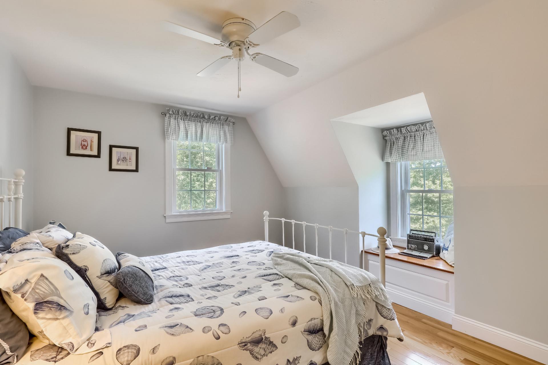 279 Service Road East Sandwich, MA 02537 - Photo 21 of 44 a bedroom with a large bed and a window