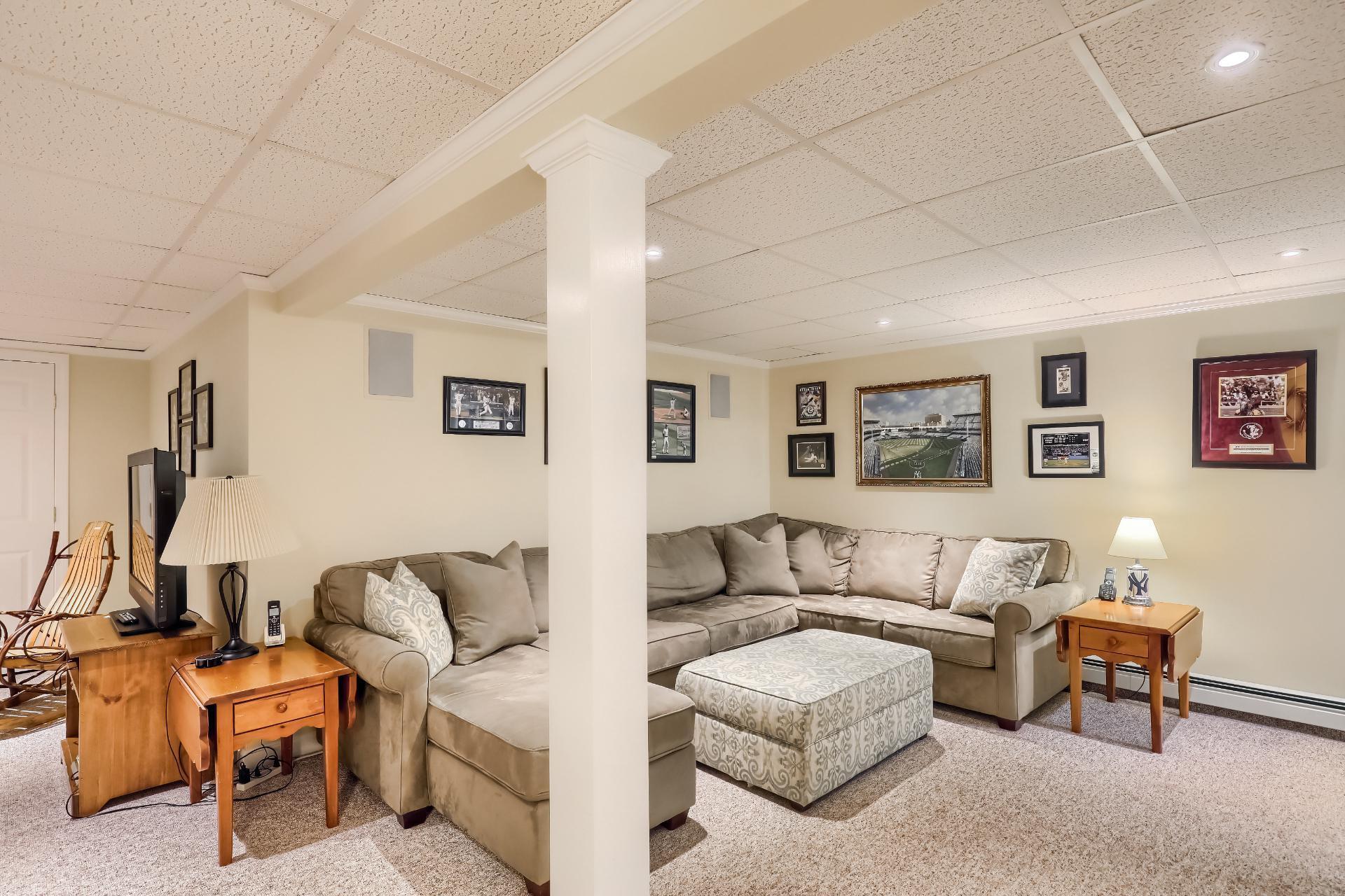 279 Service Road East Sandwich, MA 02537 - Photo 29 of 44 a living room with furniture and a couch