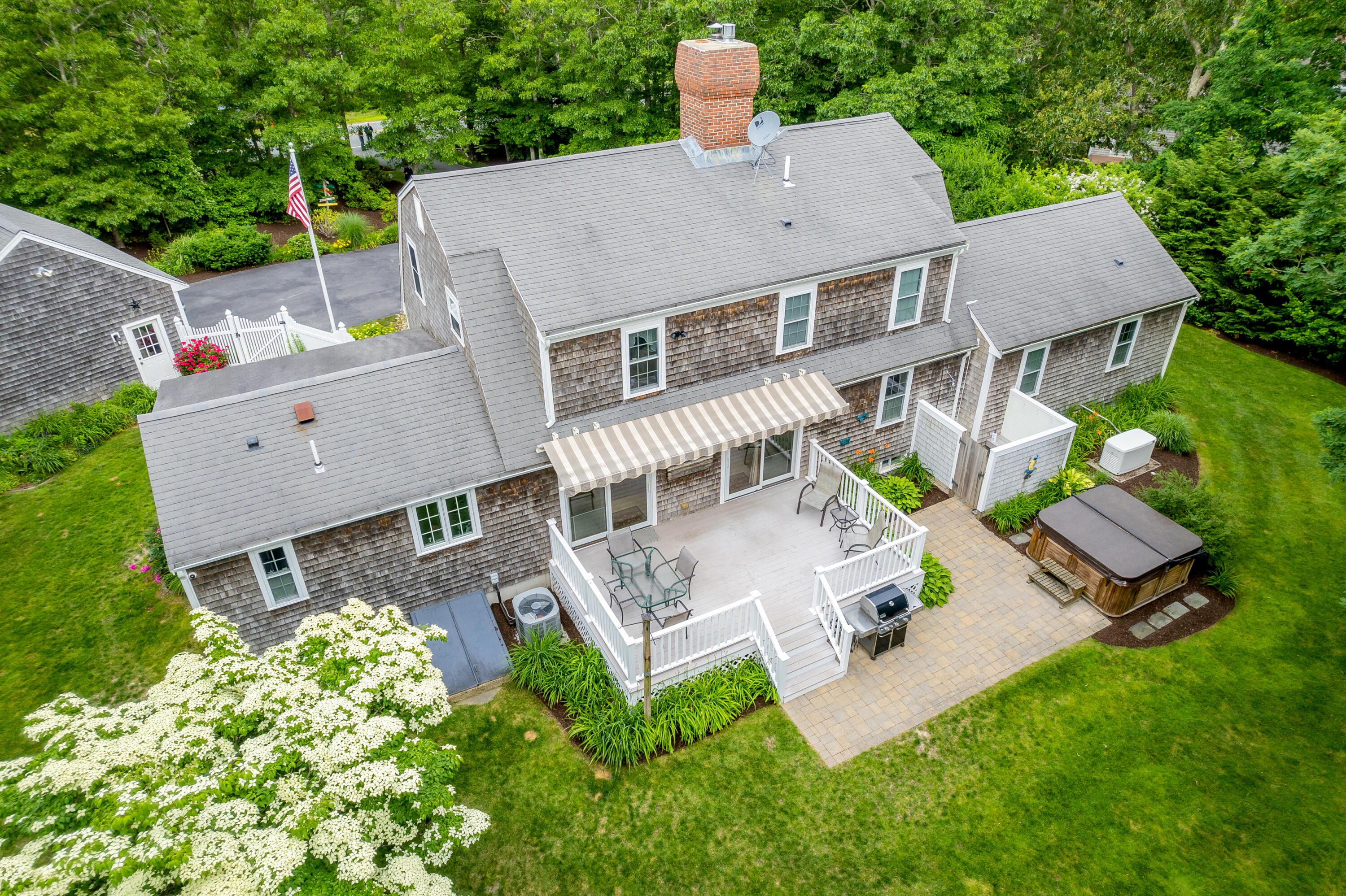 279 Service Road East Sandwich, MA 02537 - Photo 4 of 44 an aerial view of a house with garden space and street view
