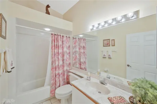a view of storage and utility room with washer and dryer
