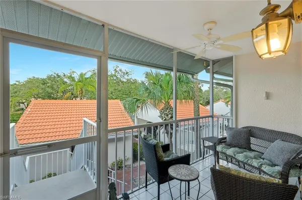 a view of a balcony with chair