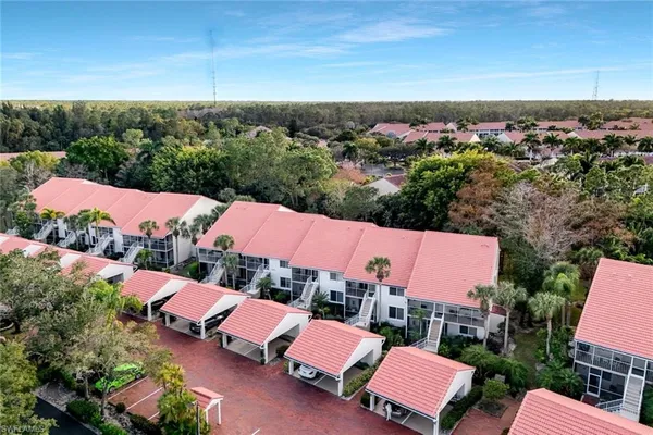 an aerial view of a house with outdoor space
