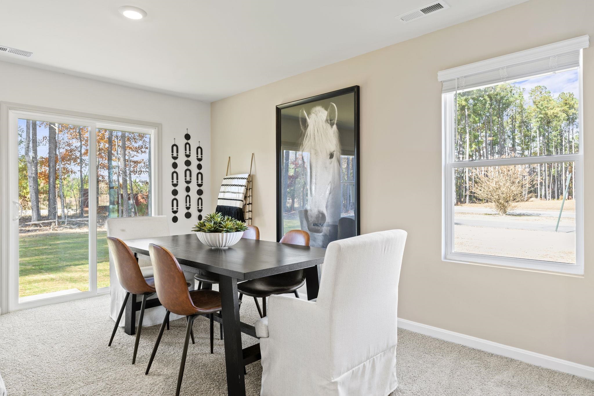 403 Stonewall Jackson Boulevard Staunton, VA 24401 - Photo 21 of 25 a dining room with furniture a rug and wooden floor