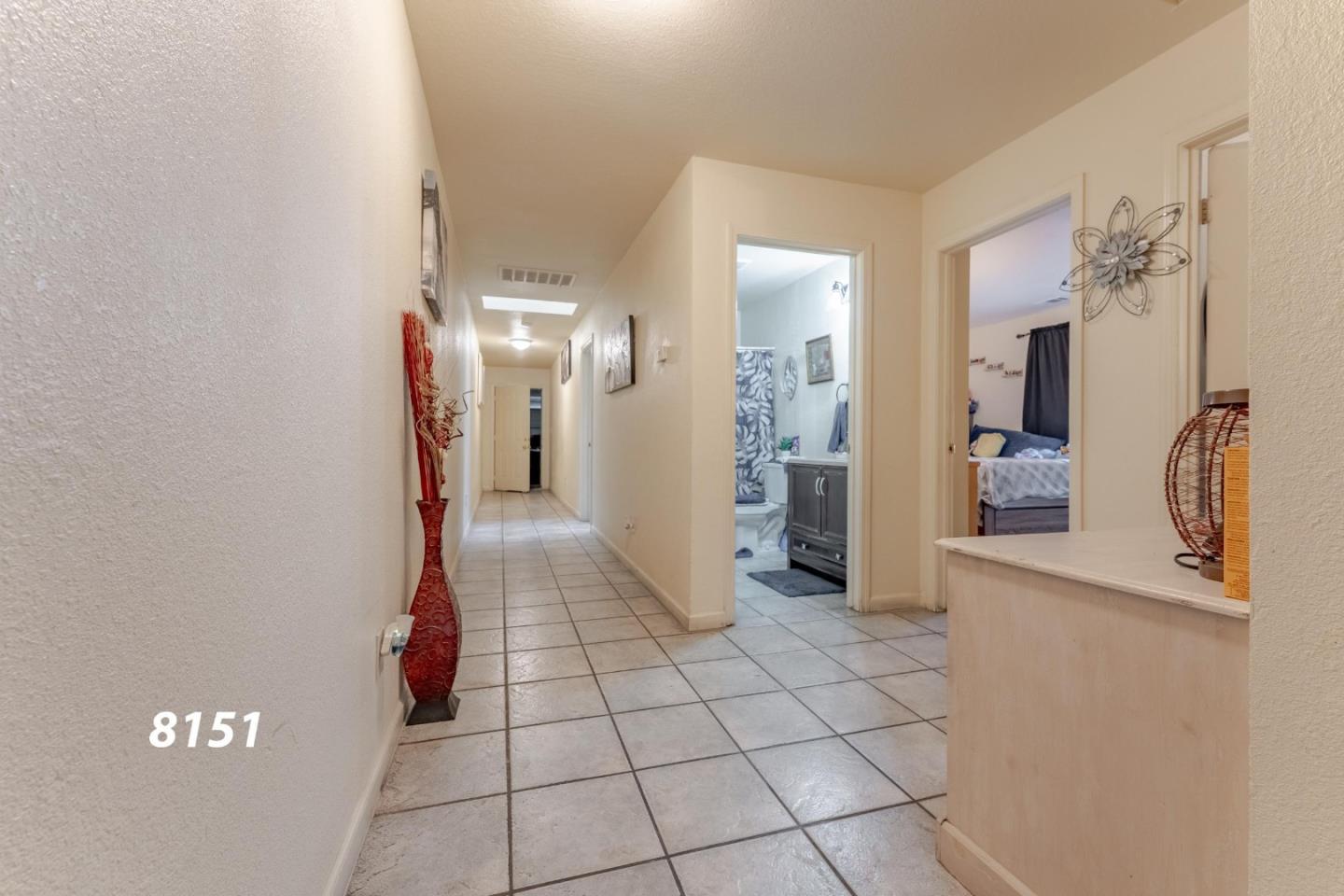 8151 Forest Street Gilroy, CA 95020 - Photo 27 of 43 a view of a refrigerator in kitchen and a window